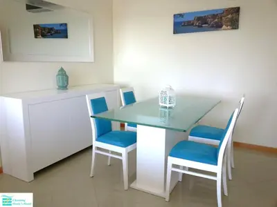 a small bathroom with a toilet and a sink at Bright apartment with sea view in Albufeira - 62 m², Pool in Albufeira