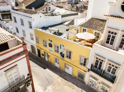 an overhead view of a city with buildings at Faro Downtown Ria Formosa I in Faro