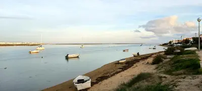 a body of water with boats in it at Casa Senhora da Ria- localização perfeita em Faro in Faro