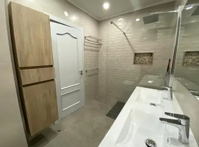 a bathroom with a white sink and a shower at CosyAvenida Mar, 2 rooms in Quarteira