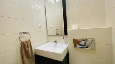 a bathroom with a sink and a mirror at Santa Maria N by Check-in Portugal in Albufeira