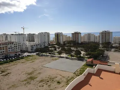 a view of a city with tall buildings at Apartamento Carvalhal in Quarteira