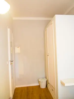 a bathroom with a toilet in a room at Alagoa Terrace Guesthouse in Faro