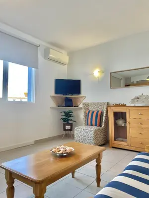 a living room with a coffee table and a couch at Bayview Apartment 106 in Albufeira