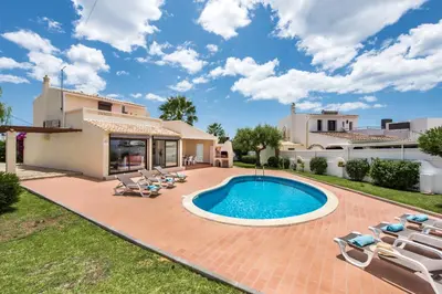 an image of a villa with a swimming pool at Isabel by Algarve Villa Holidays in Galé