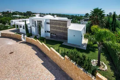an aerial view of a house with a wall at Vista Mar by Algarve Villa Holidays in Sesmarias