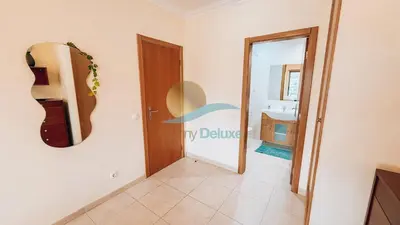 a room with a mirror and a door to a bathroom at Monte da Balaia Prime by Sunny Deluxe in Albufeira