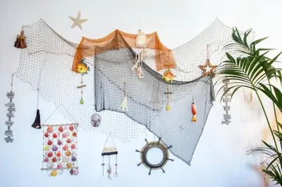 a string of ornaments hanging on a wall at Dreamers Duplex with Seaview in Faro