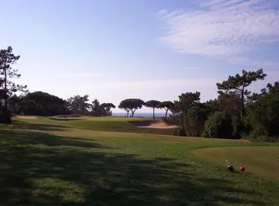 a view of the ninth green at a golf course at Centralgarve - 1 Bedroom Apartment Near the Beach in Quarteira - Anglo Atlântico in Quarteira