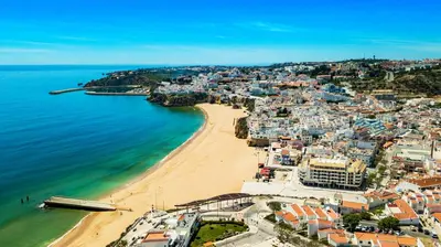 an aerial view of a beach and the ocean at Albufeira Beach 1 by Homing in Albufeira