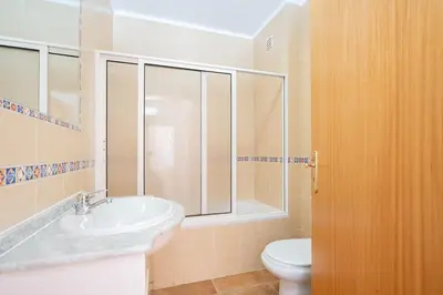 a bathroom with a sink and a toilet at Recanto da Galé by Umbral in Albufeira