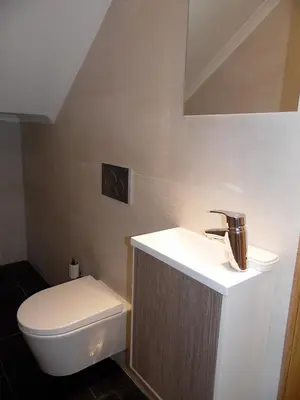 a bathroom with a sink and a toilet at Paradise in Olhos D'água Beach in Albufeira