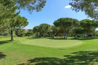 a view of a golf course with a green at FLH Balaia Village Apartment with Pool I in Olhos de Água