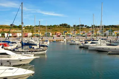a bunch of boats docked in a harbor at Villa Simão in Quinta da Balaia in Albufeira