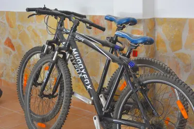 two bikes are parked next to each other at VILA CRISTINA MAR (8 guests and oceanview) in Albufeira