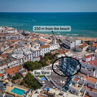 a city with the words from the beach and bay view at Bay View by OCvillas in Albufeira