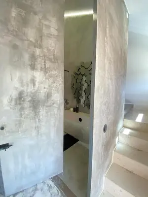 a white bathroom with a sink and a staircase at Vilamoura Marina Mezzanine Loft in Vilamoura