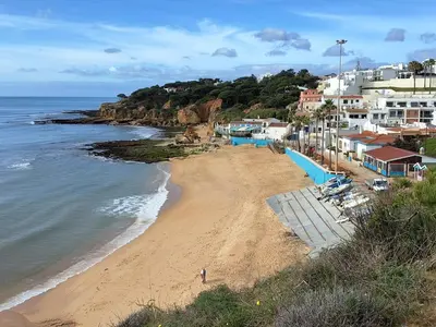 a view of a beach with houses and the ocean at Villa Sunshine in Roja- Pé