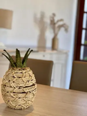 a pineapple sitting on top of a table at Villa Cristina 9 in Albufeira