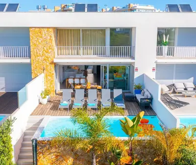 an image of a house with a swimming pool at Villa Ray Design in Albufeira
