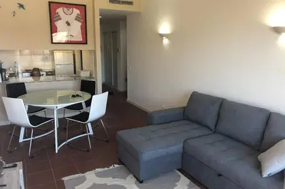 a living room with a couch and a table at Vacations home Albufeira in Albufeira