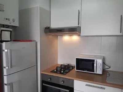 a bathroom with a toilet and a sink and a shower at Vista Praia 16- Wifi, Remodelado, 80mt Praia in Quarteira
