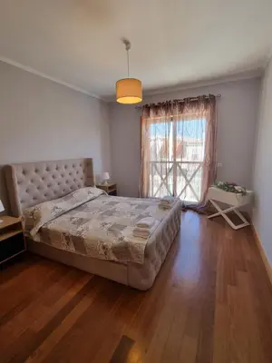 a bedroom with a large bed and a window at Luxury city Villa Olivia 10 - 15 min to the Beach Oura, private swimming pool in Albufeira