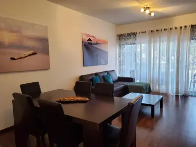 a living room with a table and a couch at 