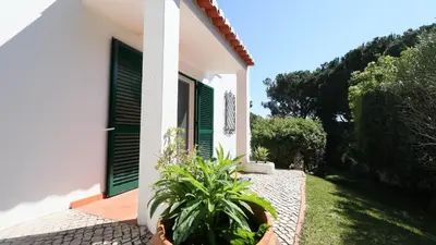 a living room with two couches and a coffee table at Beautiful Portuguese Villa Casa Das Buganvillas 3 Bedrooms Close To Praca in Vale do Lobo