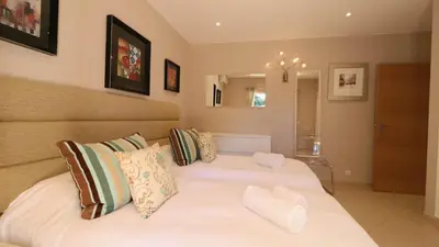 a living room with white furniture and a fireplace at Beautiful Portuguese Villa Casa Das Buganvillas 3 Bedrooms Close To Praca in Vale do Lobo