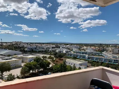 a view of a city from a balcony at Apartamento 806 in Albufeira