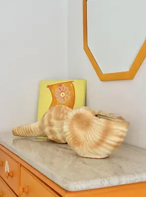 a shell sculpture sitting on top of a counter at Sunset Marina - Sea view - Vilamoura in Vilamoura