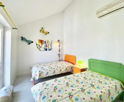 a bedroom with two beds in a room at Sunset Marina - Sea view - Vilamoura in Vilamoura