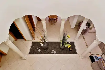 an overhead view of a living room with a table and chairs at Villa Varandas Do Lago 5 Bedroom Villa Private Pool Table Tennis in Vale do Lobo