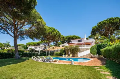 a house with a swimming pool in a yard at Villa Vale Do Lobo 626 3 Bedrooms Private Pool Short Walk To The Praca in Vale do Lobo