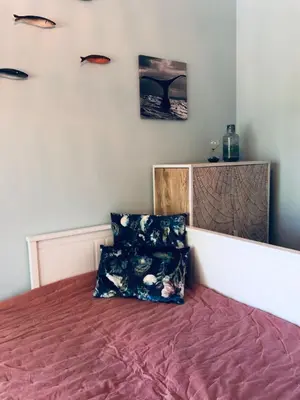 a bedroom with a bed with two pillows on it at Pinetops holidays Apartment in Albufeira