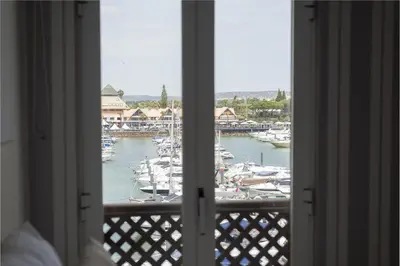 a view of a marina from a bedroom window at Marina Pearl - View to Vilamoura Marina in Vilamoura