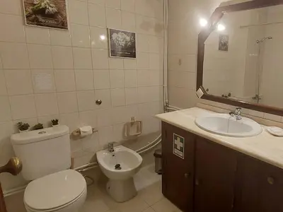 a bathroom with a toilet and a sink at Rêve au Soleil in Albufeira
