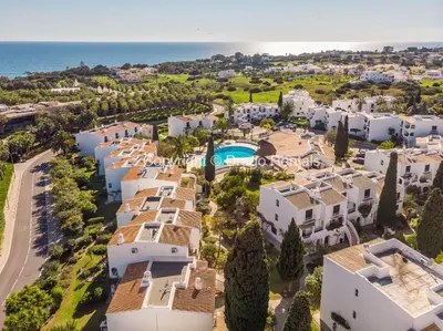 an aerial view of a villa with a resort at Coastal Retreat with Pool and Beach Access by Drago Rentals in Albufeira