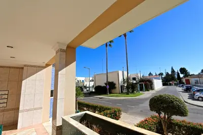 a view of a city street from a building at Vilamoura, Marina Sol T2 in Vilamoura