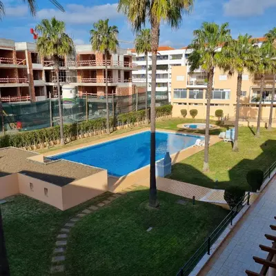 an overhead view of a swimming pool with palm trees at Vilamoura, Marina Sol T2 in Vilamoura