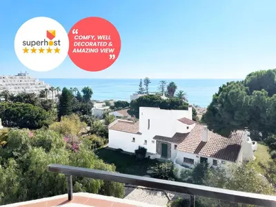 a villa with a view of the ocean at Beachfront Oura - 100m Beach, Seaview, Garage, 300m Strip in Albufeira