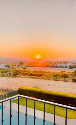 a view of the sunset from the balcony of a resort at Estrada de, Urbanizacao,edificio laranjal,apartment 18,vale carro, 8200-596 in Albufeira