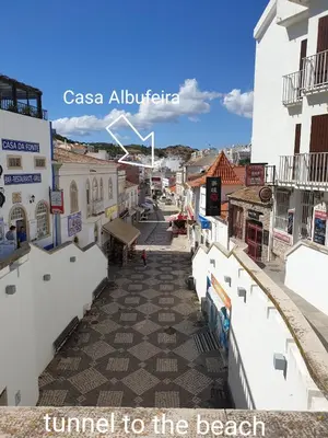 a view of a street in the town of the beach at Casa Albufeira in Albufeira