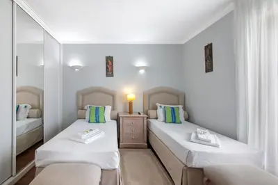 a bathroom with a shower and a toilet at Marina Vilamoura Penthouse Luxury in Vilamoura