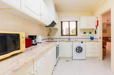a bedroom with two beds and a dresser at Steps Algarve ☀ @ Praia da Falésia 300 meters in Albufeira