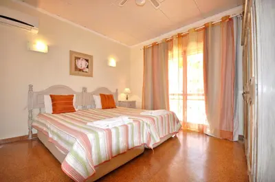 a living room with a pool table on a tile floor at Spacious Retreat with Prime Location, Private pool, snooker, free AC Wifi in Quarteira