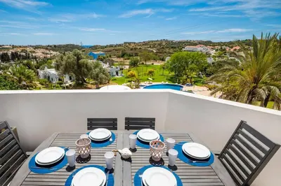 an aerial view of a beach with a crowd of people at Albufeira Family Holidays with Pool View in Albufeira