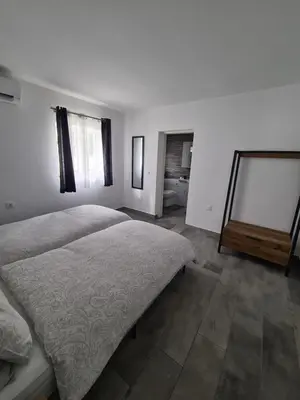 a bathroom with a sink and two toilets at Oura - Large Villa - Private Pool - 5 Bedrooms in Albufeira