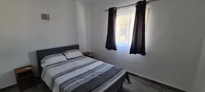 a bedroom with a bed in a room at Oura - Large Villa - Private Pool - 5 Bedrooms in Albufeira